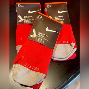 Set 3 pair men’s NWT Nike over the calf soccer socks.  Shoe size 8-12